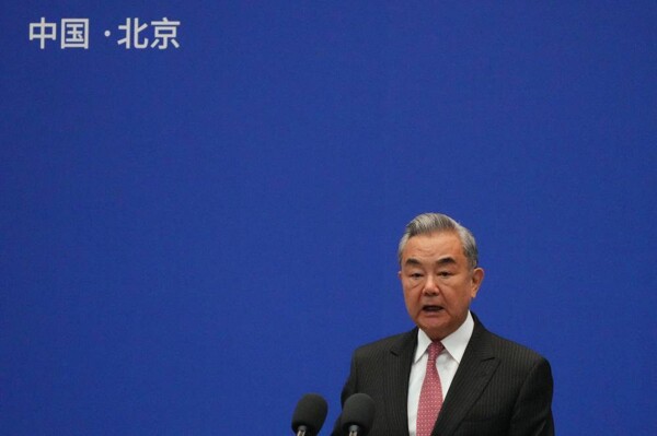 China's top diplomat sees 'positive signs' in ties with Japan